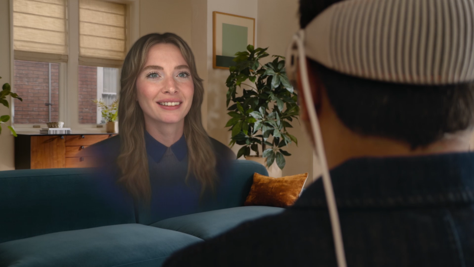 a person talking to a Persona with Vision Pro